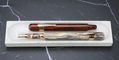 taccia_covenant_se_parchment_swirl_and_persimmon_winds _fountain_pens